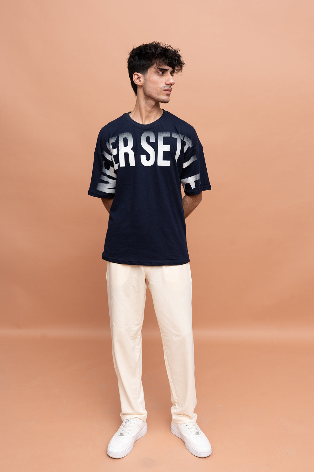 VIVE Never Settle Graphic T-Shirt for Men with Cotton Jersey Down Shoulder Style and Cotton Terry Loose Fit Trouser in Pakistan