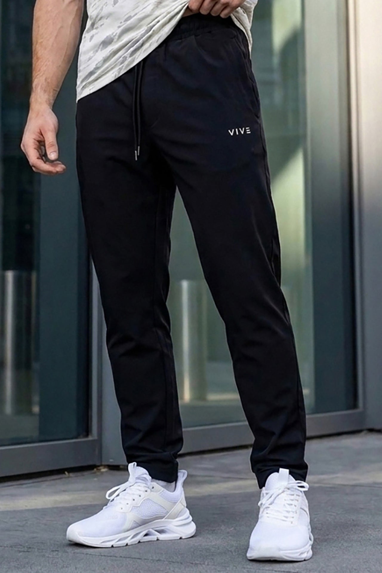 VIVE Black Relaxed Fit Trouser for men with wide-leg fit and secure side zip pockets