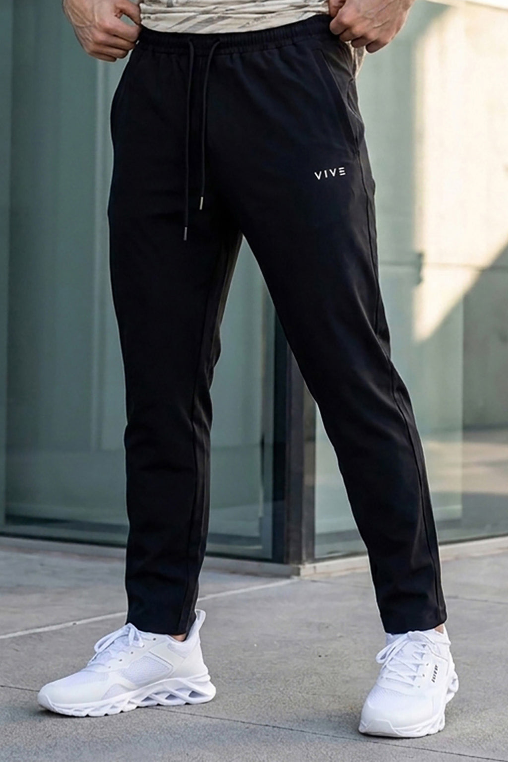 VIVE Black wide-leg relaxed fit trousers for men.