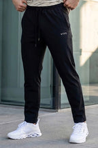 VIVE Black wide-leg relaxed fit trousers for men.