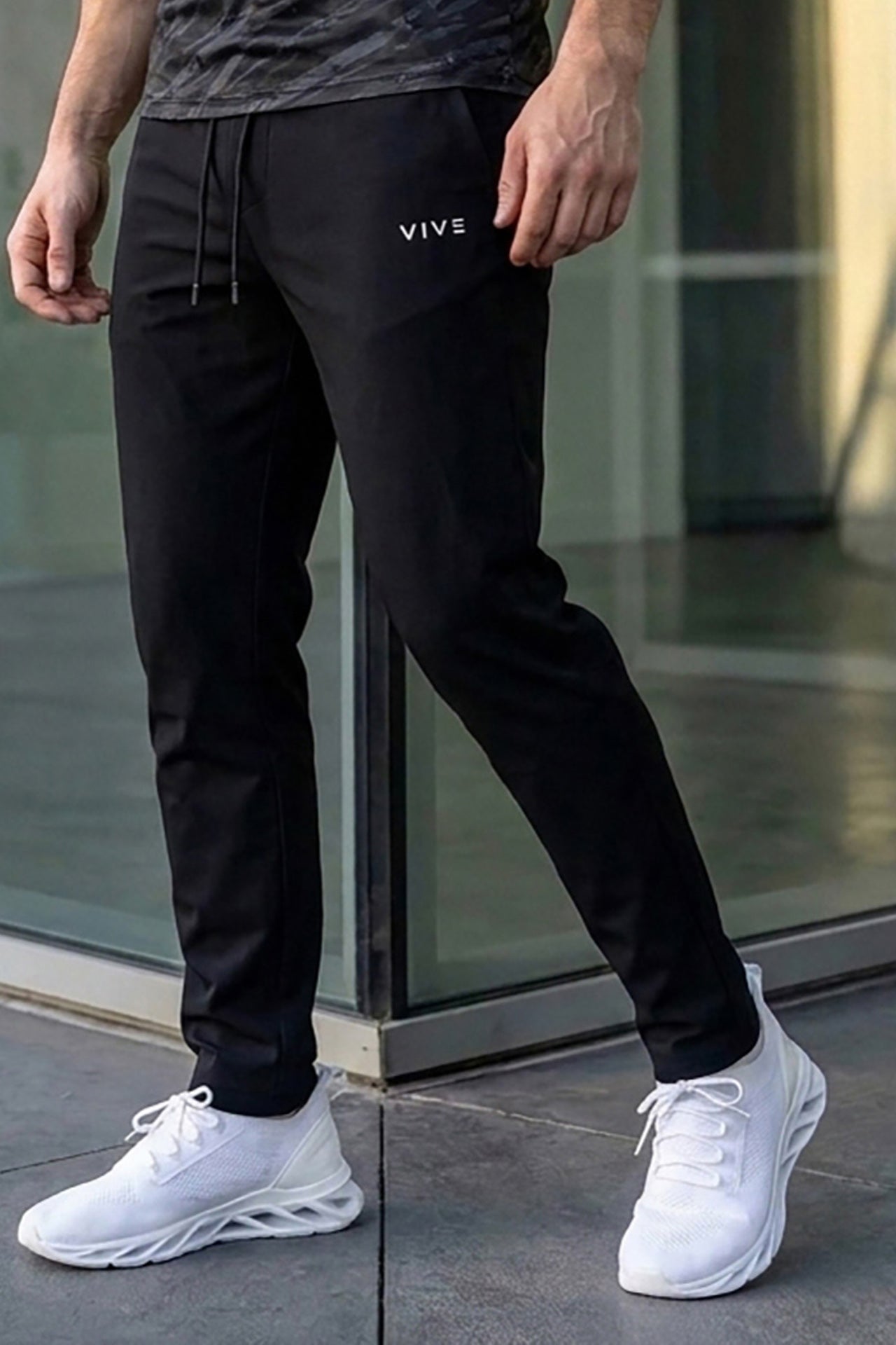 VIVE Black men's relaxed fit trousers available online in Pakistan.